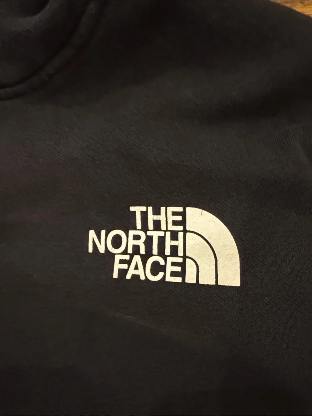 The North Face Men's Black Pullover Hoodie with White Logo fleece